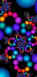 Colorful fractal spheres on dark background wallpaper.