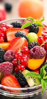 Colorful assortment of fruits and vegetables in a bowl.