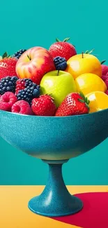 A vibrant bowl of mixed fruits with a teal background for mobile wallpaper.