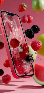 Vibrant wallpaper featuring a smartphone with splashing fruits.