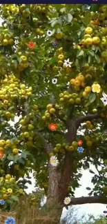 Abundant fruit tree with colorful flowers over lush green backdrop