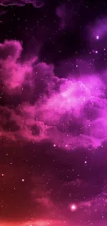 Vibrant pink and purple galaxy cloudscape with stars.