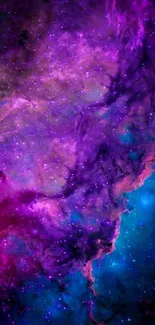 Vibrant galaxy wallpaper with purple and blue cosmic hues.