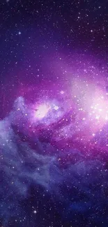 Vibrant purple and blue galaxy nebula with stars in the background.