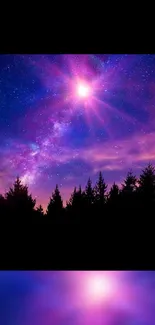 Stunning galaxy night sky with vibrant colors and silhouetted trees.