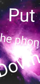 Purple galaxy wallpaper with motivational text 'Put the phone down'.