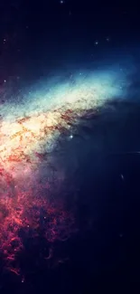 Vibrant galaxy wallpaper with fiery cosmic colors and a starlit background.