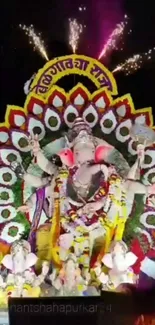 Dynamic Ganesh idol with fireworks in a festive celebration setting.