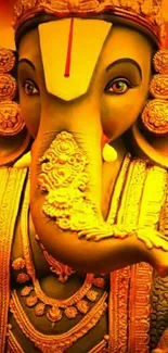 Vibrant Ganesh statue in detailed, colorful attire.