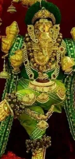 Colorful Ganesh statue with gold and green details as phone wallpaper.