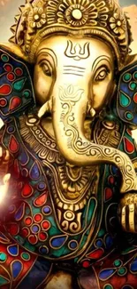 Colorful Ganesha wallpaper with gold and vibrant accents.