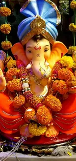 Vibrant Ganesha idol with floral garlands and traditional decor.