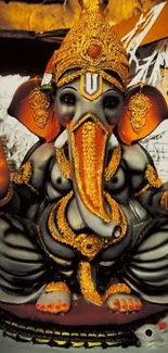 Vibrant Ganesha statue in golden tones.