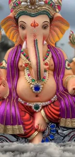 Vibrant Lord Ganesha statue with colorful attire and intricate details.