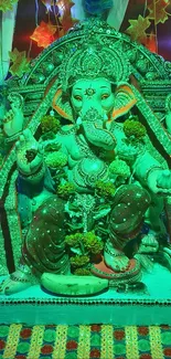 Colorful Ganesh idol adorned with flowers.