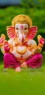 Vibrant Ganesha statue with rich colors in natural setting.