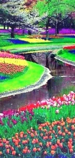 Colorful garden landscape with flowers and a stream.