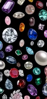 Assorted colorful gems and pearls on a black background.