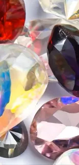 Vibrant collection of colorful gemstones creating a lively phone wallpaper.
