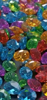 Vibrant and colorful gemstones scattered in a dazzling display on a dark backdrop.