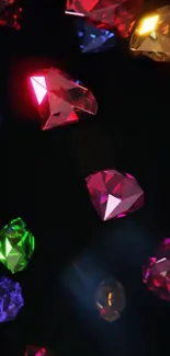 Colorful gemstones and jewels against a black background.