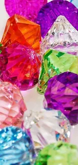 Vibrant assortment of colorful gemstone crystals on white background.