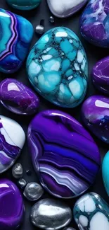 A vibrant phone wallpaper featuring colorful gemstones in purple and blue hues.