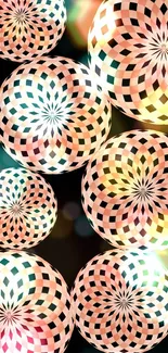 Vibrant geometric wallpaper with glowing kaleidoscope spheres and peach hues.