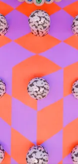 Vibrant geometric wallpaper with orange and purple patterns.