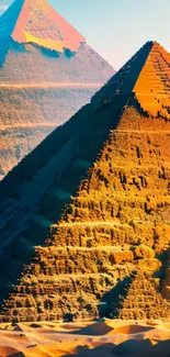 Vibrant geometric pyramids under a clear blue sky.