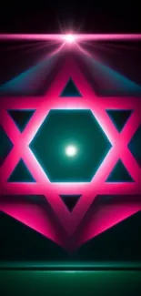 Vibrant pink and teal geometric star glowing design wallpaper.