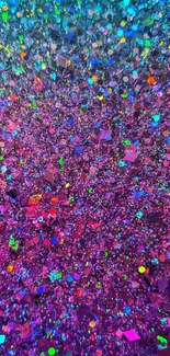 Vibrant glitter abstract wallpaper with purple, blue, and pink sparkles.