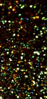 Vibrant glitter art wallpaper with colorful specks on a dark background.