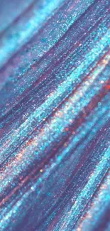 Glittery teal and pink abstract pattern wallpaper.