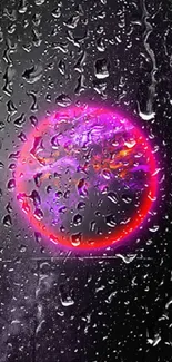 Vibrant neon globe surrounded by raindrops on dark background.