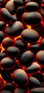 Vibrant black stones glowing with orange light on mobile wallpaper.