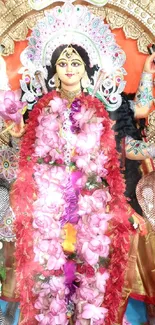 Colorful Goddess Durga adorned with vibrant flowers.