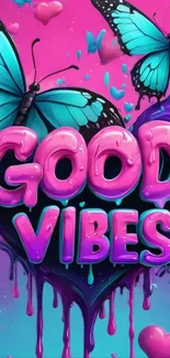 Colorful wallpaper with butterflies and 'Good Vibes' text.