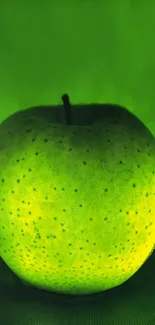 Vibrant green apple on a lush background wallpaper.