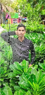 A person amidst lush green plants with raindrops on the camera lens.