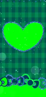 Vibrant green heart on plaid background wallpaper.