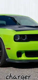 Vibrant green muscle car mobile wallpaper with bold design.