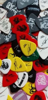 A vibrant collection of colorful guitar picks with various designs.