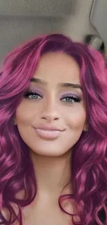 Portrait of woman with vibrant purple hair in a stylish pose.