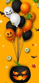 Colorful Halloween balloons wallpaper with pumpkins and bats.