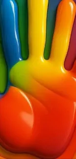 Colorful handprint with vibrant paint layers.