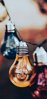 Close-up of colorful hanging light bulbs for wallpaper.