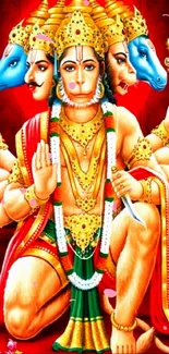 Vibrant artwork of Lord Hanuman with multiple faces on a red background.