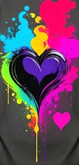 Vibrant heart with colorful splatter design on dark background.