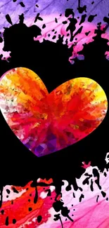 Colorful geometric heart on black splash background.